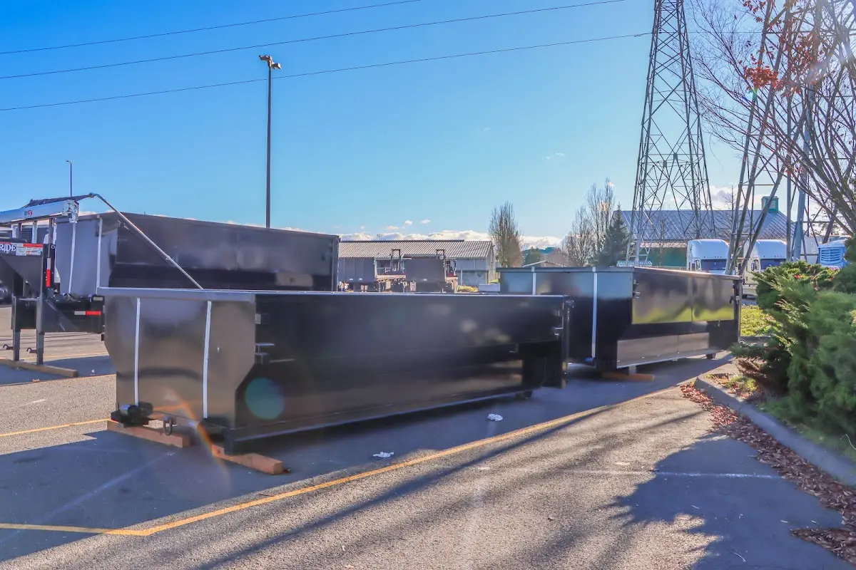 Roll-off dumpster ready for waste disposal at job site for 6 Yard Dumpster Rental in Magnolia
